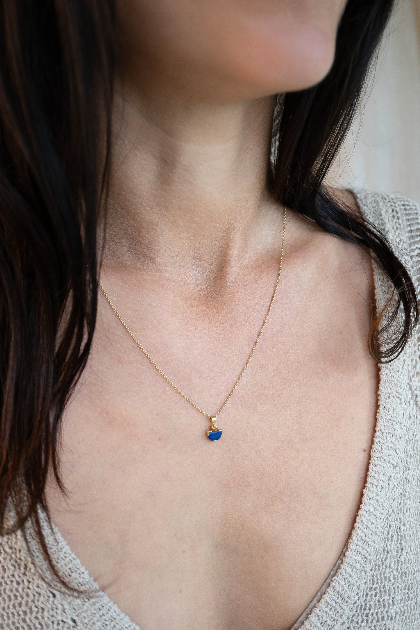 Orange sapphire and lapis Mina pendant